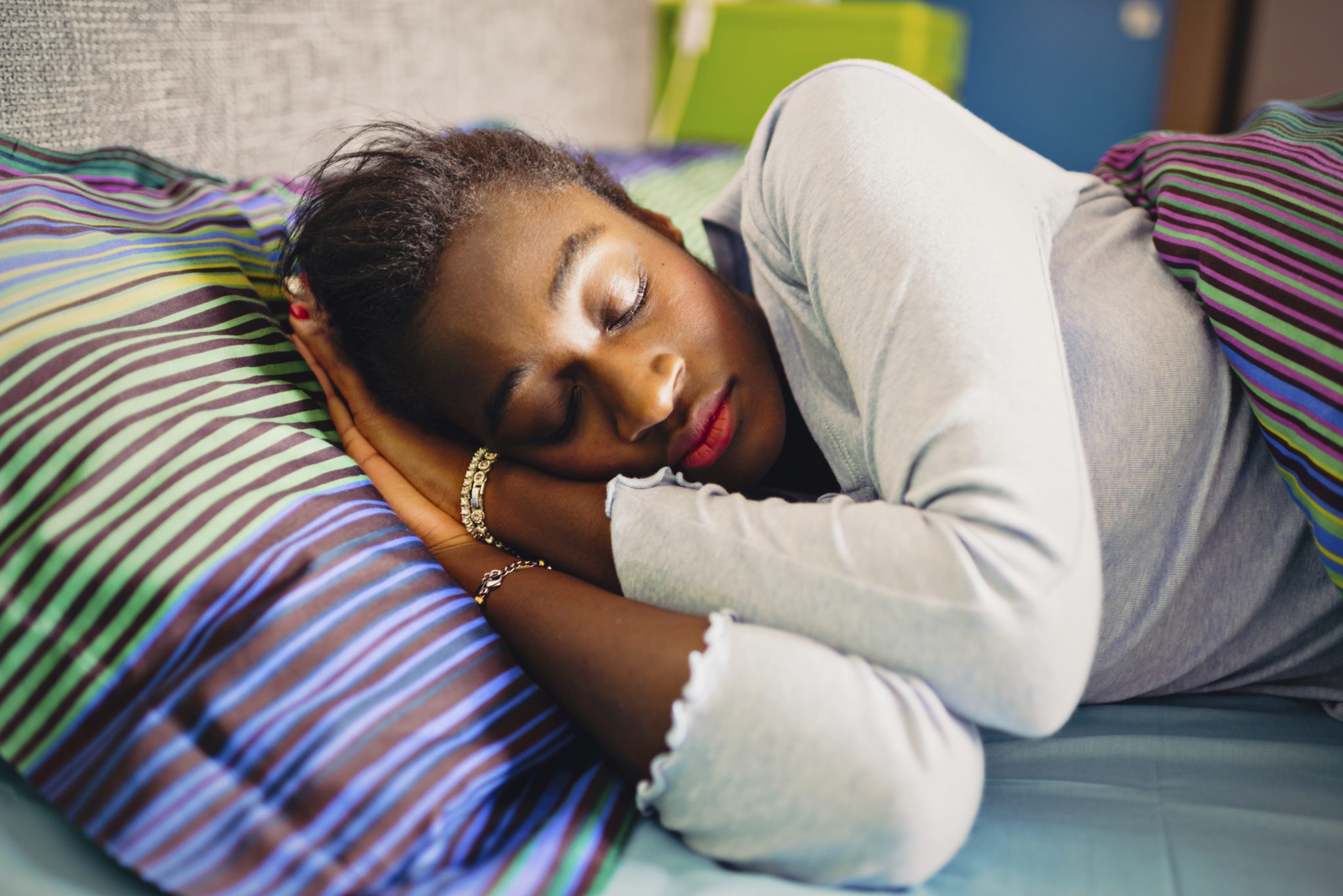 Sleeping young African woman