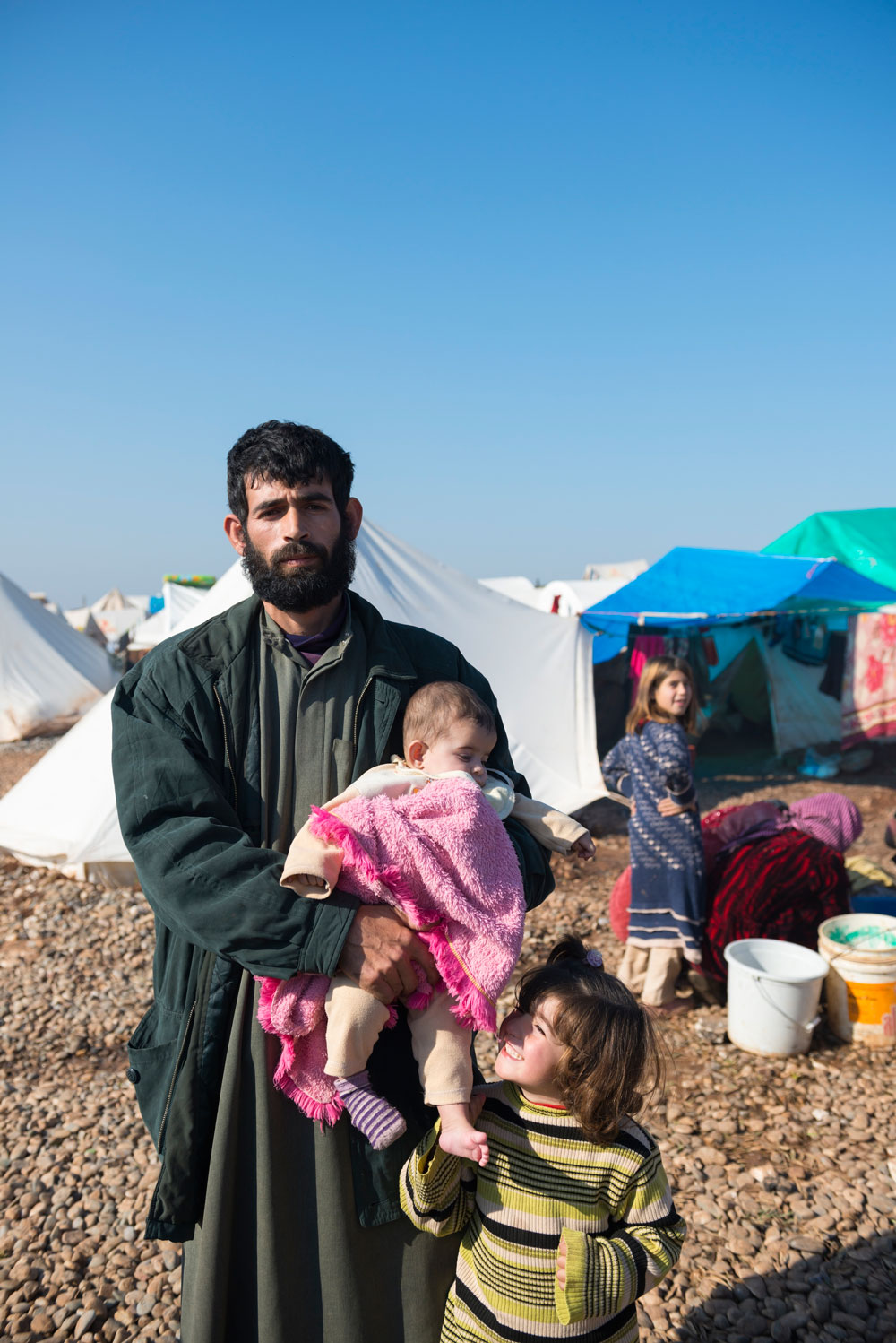 syrisk man och barn